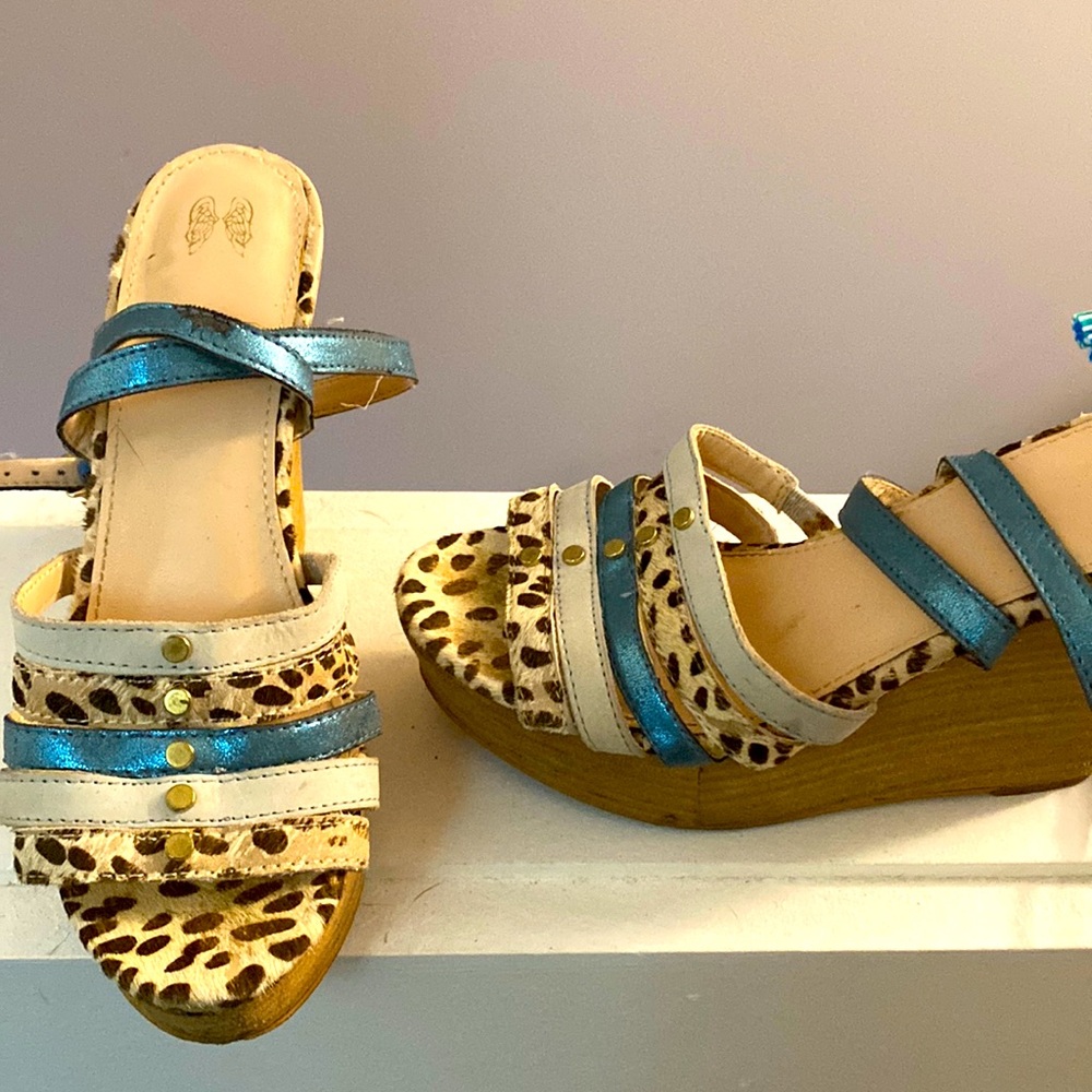 A bit worn.  Gorgeous, comfy sandals